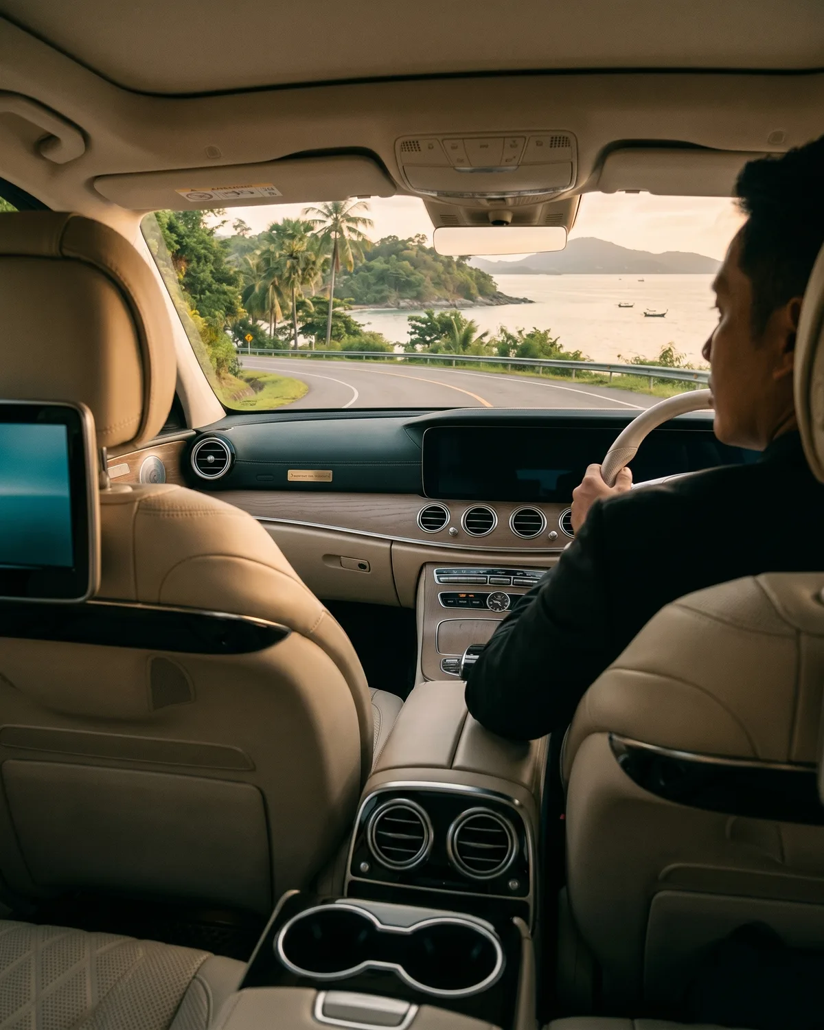 Private car with driver on the Andaman coast road in Phuket